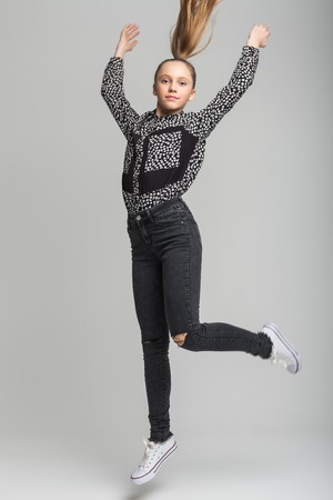 cute girl jumpingの写真素材