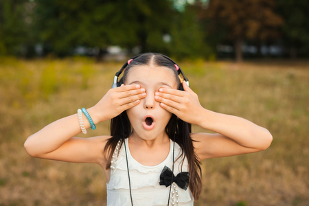 amaze girl closing her eyes on natureの写真素材