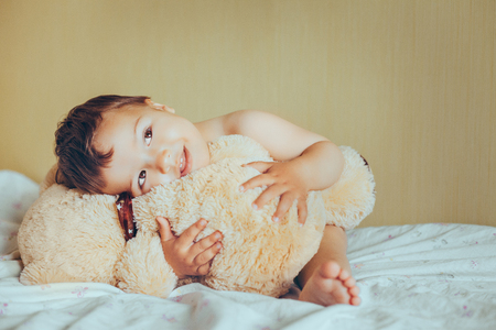 cute baby with teddy bearの写真素材