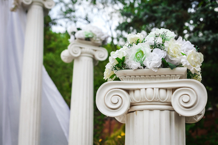 Wedding columns decorated with flowersの写真素材