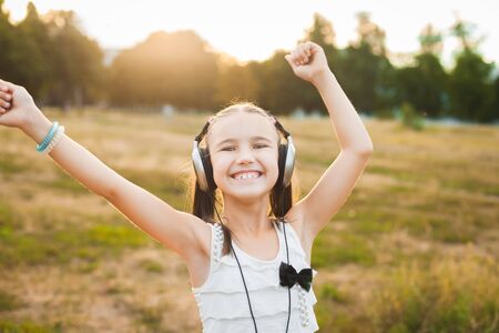 active girl listening music and dancingの写真素材