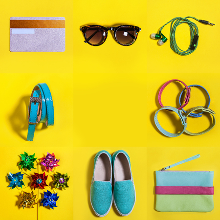 Set of womans accessories. Fashion sunglasses, colored bag, aquamarine shoes, gold credit card green earphones and bracelet. Concept of summer sale and shopping. Top view.の写真素材