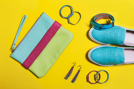 Stylish clothes for women. Fashionable blue belt, colored bag, aquamarine shoes and accessories. Spring summer hipster trend. Top viewの写真素材