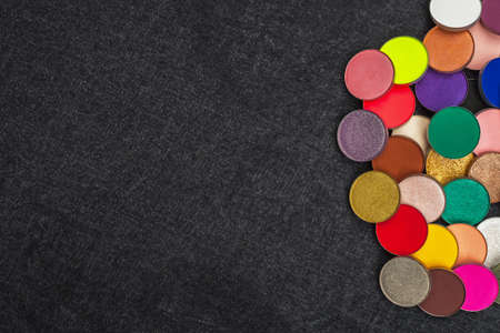 collection of round eyeshadows on black background. professional cosmeticの写真素材