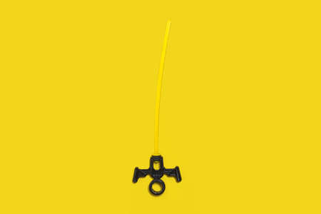 small toy for children on the yellow backgroundの写真素材