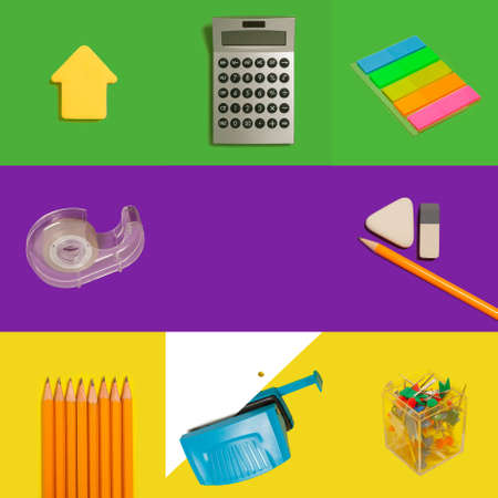 stationery on green purple and yellow backgroundの写真素材