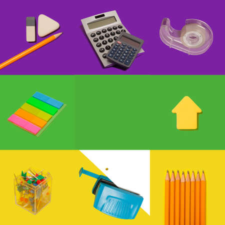 stationery on green purple and yellow background.の写真素材
