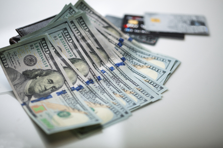 Cash and credit cards .Dollary hundred.