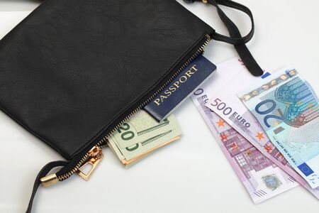 money cash in black woman bag