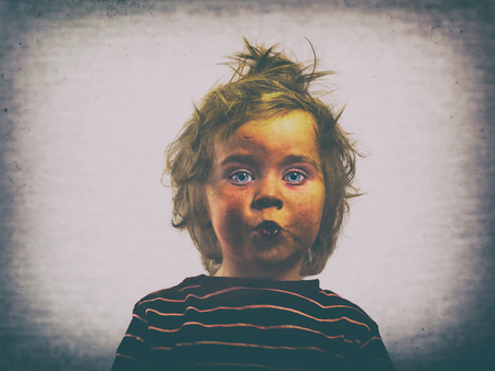 happy funny baby toddler blonde hair boyの写真素材