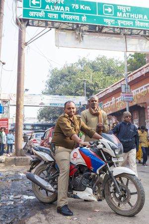 Transport and people on the roads of India. India, Vrindavan, November 2016のeditorial素材