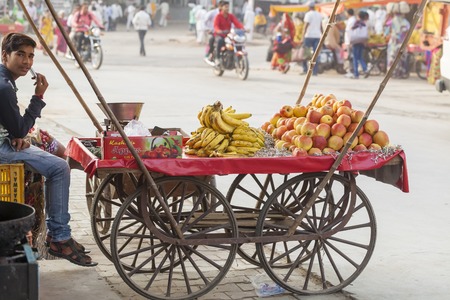 Transport and people on the roads of India. India, Vrindavan, November 2016のeditorial素材