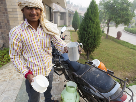 Transport and people on the roads of India. India, Vrindavan, November 2016のeditorial素材