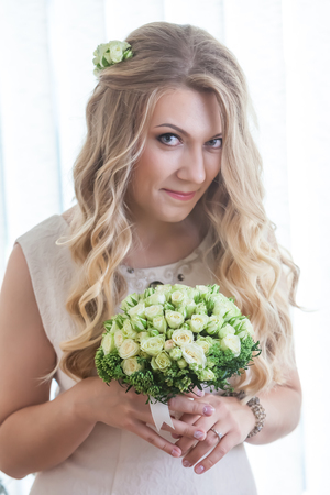 Happy newlyweds near bride and groomの写真素材