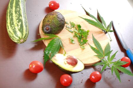 Fresh hemp leaves for salad preparation. The medical cannabis
