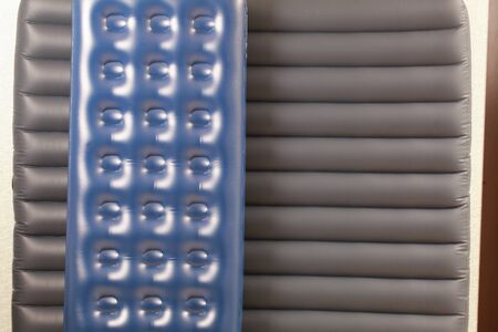 Blue inflatable mattress for sleeping and restingの写真素材