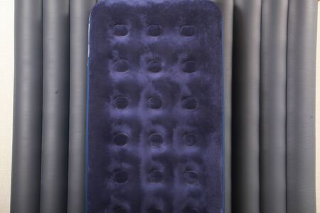 Blue inflatable mattress for sleeping and restingの写真素材