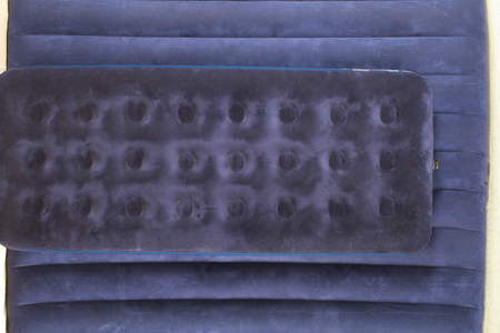 Blue inflatable mattress for sleeping and restingの写真素材