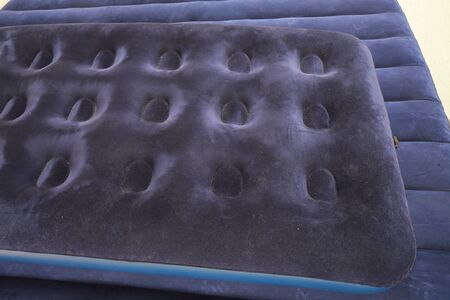 Blue inflatable mattress for sleeping and restingの写真素材