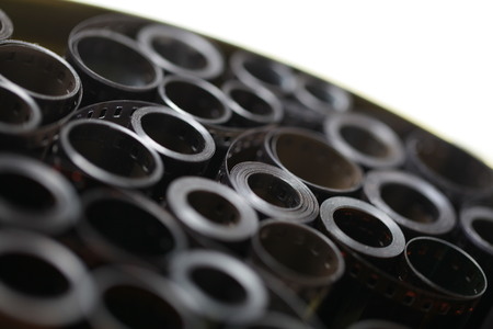 film archive negatives in a round metal canの写真素材