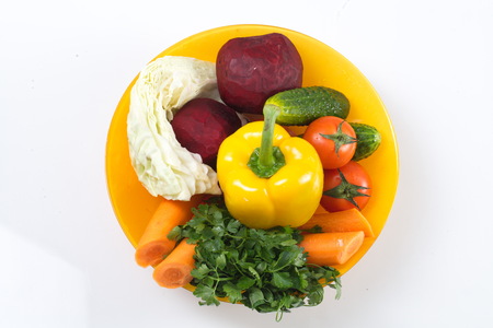 fresh vegetables on a plateの写真素材