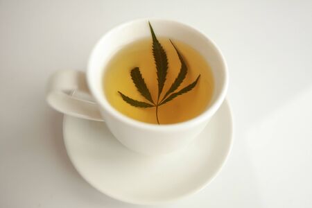 cannabis tea white cupの写真素材