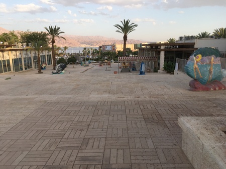 Illustrative editorial painted graffiti of sculpture fish in the square of the city of Eilat....