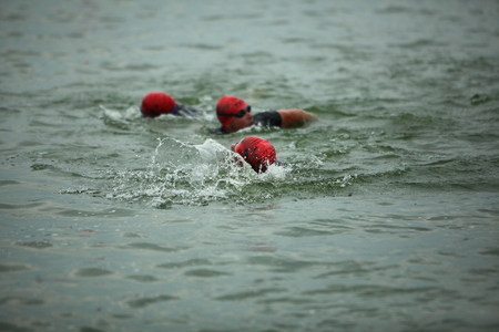 Belarus, Minsk, July 22, 2018: athletes participants swimming competitions Minsk Triathlonのeditorial素材