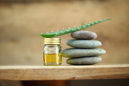 Aloe  oil spa therapy wood backgroundの写真素材