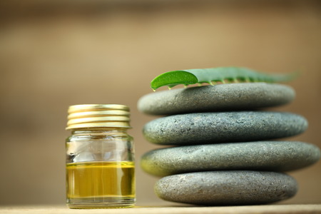 Aloe oil spa therapy wood backgroundの写真素材