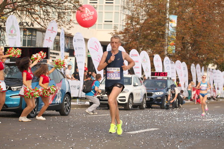Belarus, Minsk, September 2018: athletes and fans of the Minsk half marathon start finishのeditorial素材