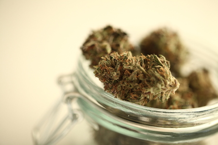 medical cannabis marijuana in a glass jarの写真素材