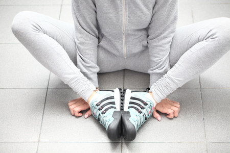 Belarus, Minsk, March 18, 2012. The girl in sneakers Adidas terrex trainingのeditorial素材