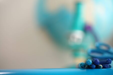 Concert education globe books microscope and pencils on background.の写真素材