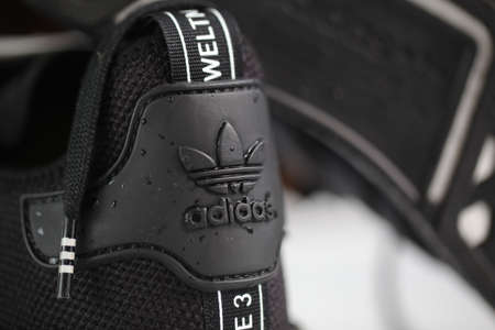 black sports shoes adidas model NMD_R1.Belarus,Minsk,2020のeditorial素材