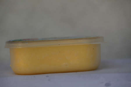 melted cow butter in plastic packaging, sri lanka,hikkaduwa,2019のeditorial素材