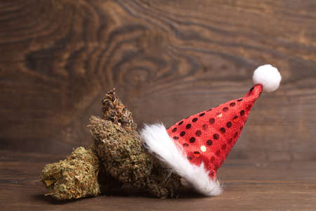 big cannabis cone christmas decoration. marijuana close up. hemp buds.の写真素材