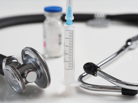 bottle vaccine and syringe. medicine stethoscopeの写真素材