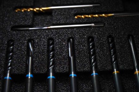 Belarus, Minsk, 2021. set of Japanese taps in a box. metal threading tool