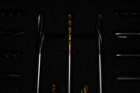 Belarus, Minsk, 2021. set of Japanese taps in a box. metal threading toolのeditorial素材