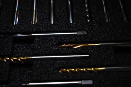 Belarus, Minsk, 2021. set of Japanese taps in a box. metal threading tool