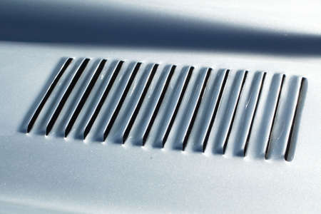air intake grille on the body of a retro car