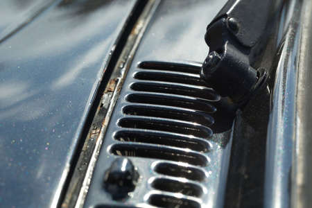 air intake grille on the body of a retro car