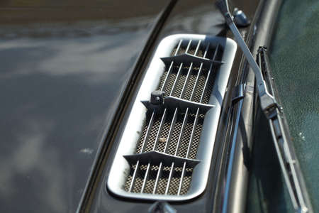 air intake grille on the body of a retro car