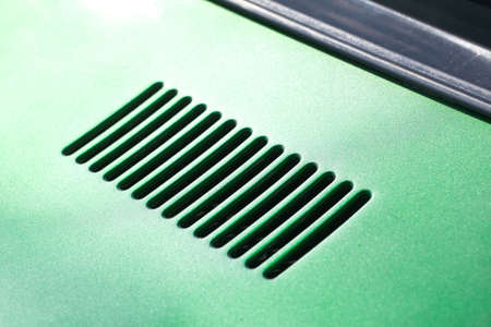 air intake grille on the body of a retro car