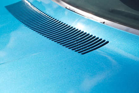 air intake grille on the body of a retro car