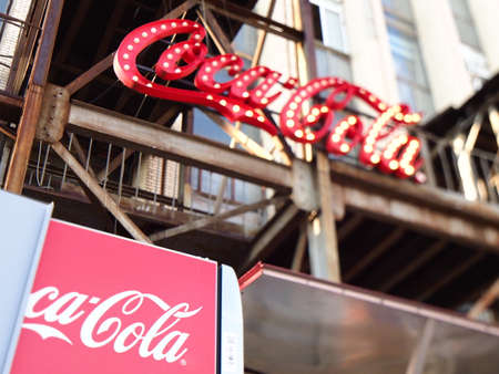 belarus, minsk, 2021.coca-cola brand logo on city. editorial images popular food playground city sandbox. people buy food in food truckのeditorial素材