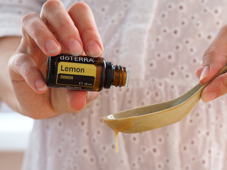 doterra home essential lemon oil used womanのeditorial素材