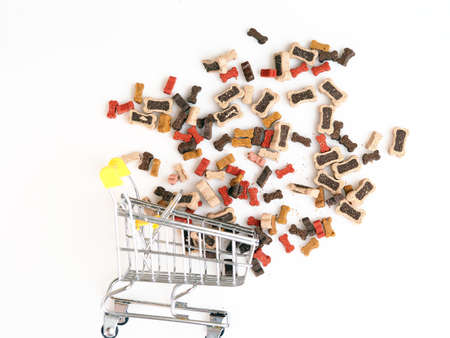 shopping cart dog food bones on white backgroundの写真素材