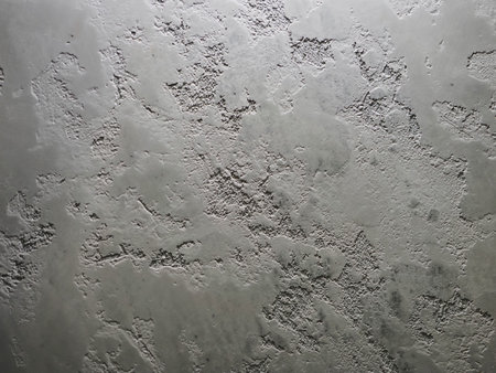 gray wall texture of antique decorative plasterの写真素材